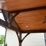covered patio with landscaping