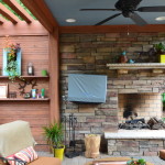 pool and patio with landscaping