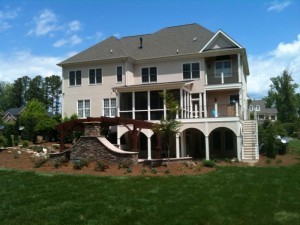 Cary backyard landscape pergola patio fireplace